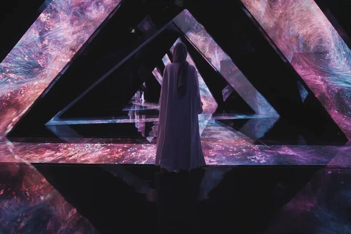 Explore mesmerizing light displays and intricate designs as you navigate through chambers filled with wonder where every corner invites imagination and discovery in Dubai's AYA Universe.